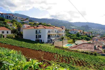 a group of houses on top of a hill at Namastê House II in Funchal