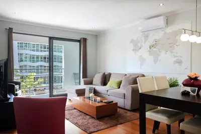 a living room with a couch and a table at GuestReady - A sunny delight in Funchal in Funchal
