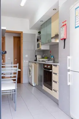 a kitchen with a sink and a dishwasher at GuestReady - A sunny delight in Funchal in Funchal