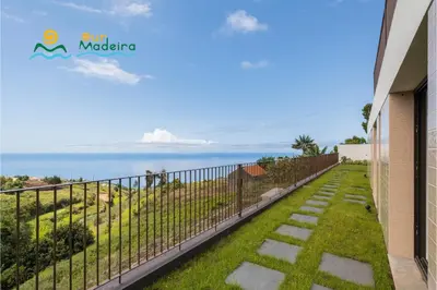 a balcony with a view of the ocean at OurMadeira - Calheta Pearl in Estreito da Calheta