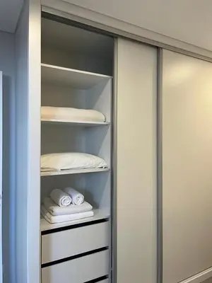 a closet with some folded towels in it at Ocean Paradise do Til in Funchal