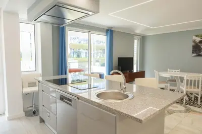 a kitchen with a sink and a counter top at D.Henrique I apartamento frente ao Savoy Palace in Funchal