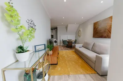 a living room with a couch and a table at SWEET home I in Caniçal