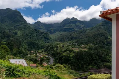 a view of a valley with mountains in the background at Casa do Rosário by An Island Apart in São Vicente