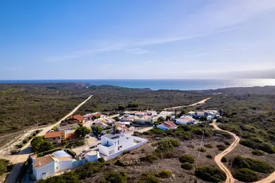 an aerial view of a village with the ocean in the background at Villa Sonata in Ingrina Sol in Raposeira
