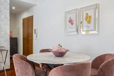 a dining room with a table and chairs at Fifth Apartment by Homie in Funchal