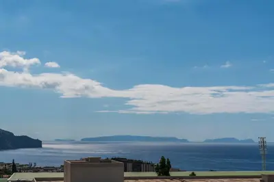 a view of the ocean from a building at Vista Mar I by An Island Apart in Funchal