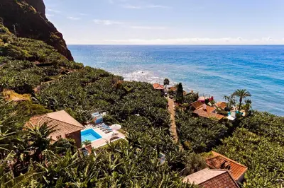 an aerial view of the ocean and a resort at Beautiful Calheta Villa Villa Do Mar Iii 3 Bedrooms Infinity Pool in Arco da Calheta
