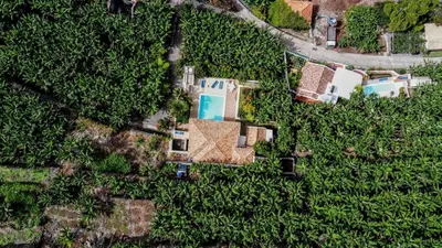 an overhead view of a house in a forest at Beautiful Calheta Villa Villa Do Mar Iii 3 Bedrooms Infinity Pool in Arco da Calheta
