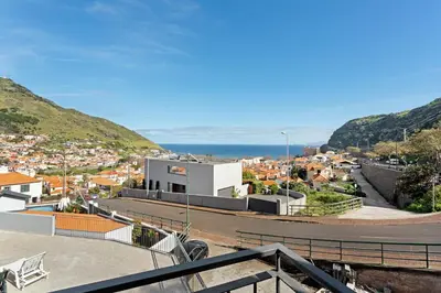 a view of a city from the top of a building at Casa da Pontinha in Machico