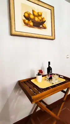 a wooden table with a picture of lemons on it at Casa Gina, with views to Funchal Bay in Funchal
