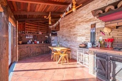 a kitchen with a table and a counter top at Terrace to Atlantic in Santa Cruz