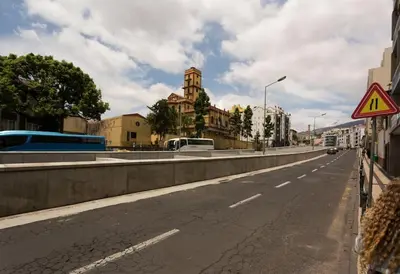 an empty street in a city with a building at Casa Primavera - renovated duplex in city centre in Funchal