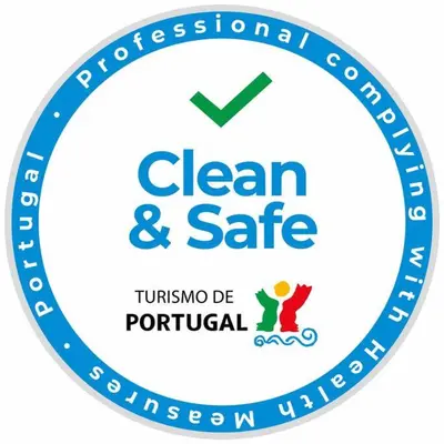 a blue clean and safe logo in a circle at Apartment Banana Panorama: central Lido area in Funchal