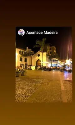 a picture of a building in a city at night at Casa Zona Velha - Caetano in Funchal