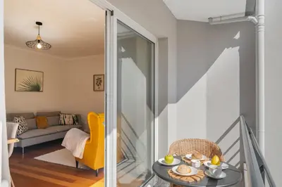 a living room with a couch and a table at Ribeira Brava I by An Island Apart in Ribeira Brava
