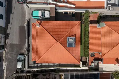 an overhead view of a building with an orange roof at Casa da Amoreira by An Island Apart in Funchal