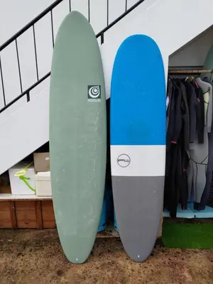 two surfboards are standing next to each other at Mola Mola Sagres in Sagres