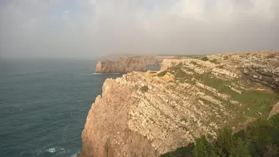 an image of a cliff near the ocean at Casa Sereia Praia in Salema