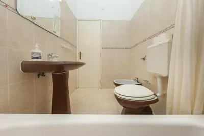 a bathroom with a toilet and a sink at B68 - Luz Vista Mar Apartment in Luz