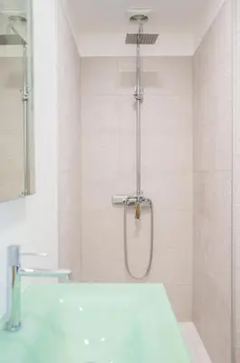 a bathroom with a shower and a sink at Sweet Home Madeira in Camacha