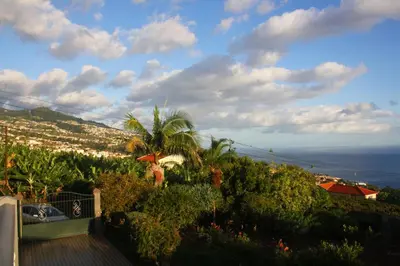 a view of the ocean from the balcony of a house at Lugar dos Louros 1 in Estreito da Calheta
