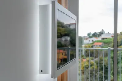 an open window with a view of a balcony at Villa 65 - City Edge Retreat in Funchal