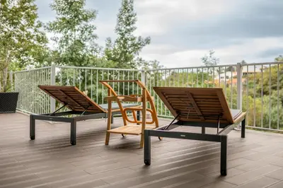 two chairs sitting on top of a deck at Villa 65 - City Edge Retreat in Funchal