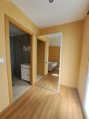 a room with a sliding glass door and a bedroom at Calheta Countryside in Calheta