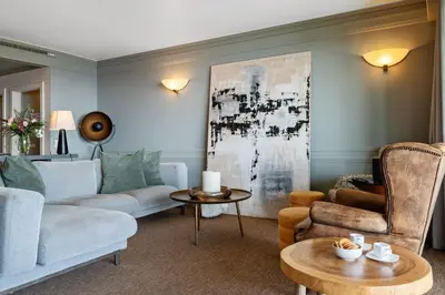 a living room with a view of the ocean at Luxury Oceanfront at Reid's Gardens in Funchal