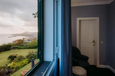 a window with a view of the ocean at Quinta São Gonçalo in Funchal