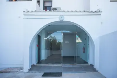 an entrance to a building with an archway at Bella Sunset Holidays - 3 min da Praia da Mareta in Sagres