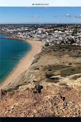 an aerial view of a beach and a city at Beautiful 2 bed townhouse on Boavista golf course in Lagos