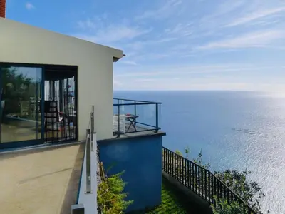 a house with a view of the ocean at Atlantis Country House in Calheta