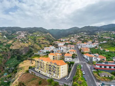 an aerial view of a town on a mountain at Bela Vista Valley in Calheta
