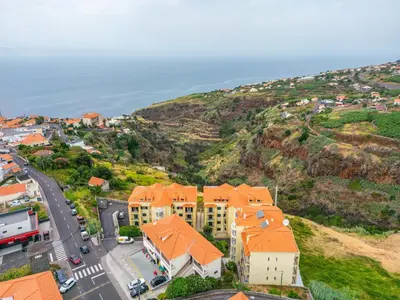 an aerial view of a house on a hill at Bela Vista Valley in Calheta