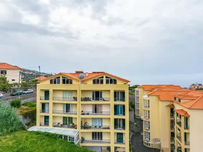 an overhead view of a building with orange roofs at Bela Vista Valley in Calheta
