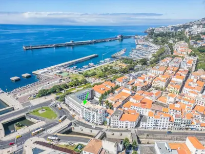an aerial view of a city and the ocean at SUPER Central - Cork in Funchal