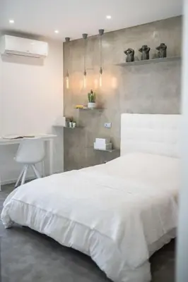 a bedroom with a white bed and a desk at SUPER Central - Silver in Funchal