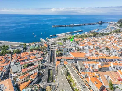 an aerial view of a city and the ocean at SUPER Central - Silver in Funchal