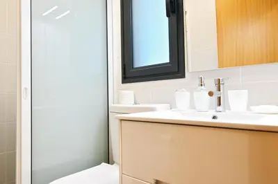 a bathroom with a sink and a mirror at Casa Familia Pestana 1, a Home in Madeira in Seixal