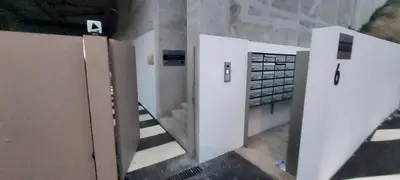 an empty parking garage with a car parked in it at Koala Bay Place in Funchal