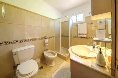 a bathroom with a toilet and a sink at Casa do Tornadouro by Mth in Ponta do Sol