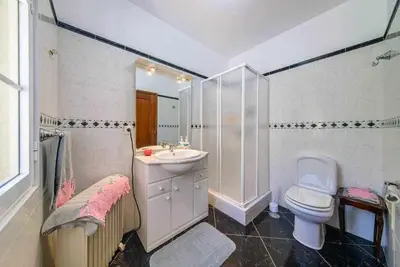 a white bathroom with a sink and a toilet at Casa do Tornadouro by Mth in Ponta do Sol
