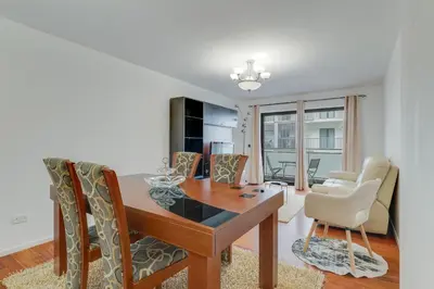 a dining room with a table and chairs at Ramos Apartment by Holiday Rental Madeira in Funchal