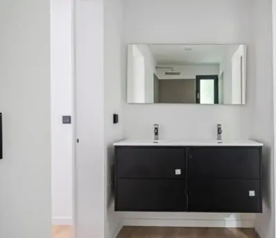 a bathroom with a sink and a mirror at Over Sea in Funchal