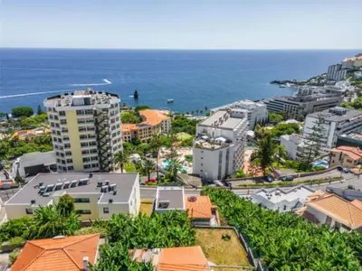 an aerial view of a city and the ocean at Over Sea in Funchal