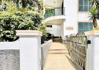 a stairway leading to a building with a balcony at Apartment Paulo by Your Madeira Rentals in Ponta do Sol