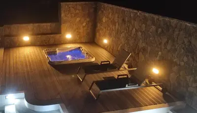 an overhead view of a jacuzzi tub in a room at Casa da Ponta Negra in Vila do Porto