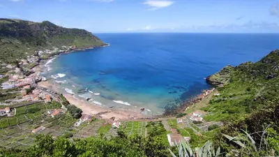 an aerial view of a beach and the ocean at Casa da Ponta Negra in Vila do Porto